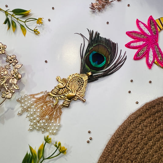 Peacock feather broach